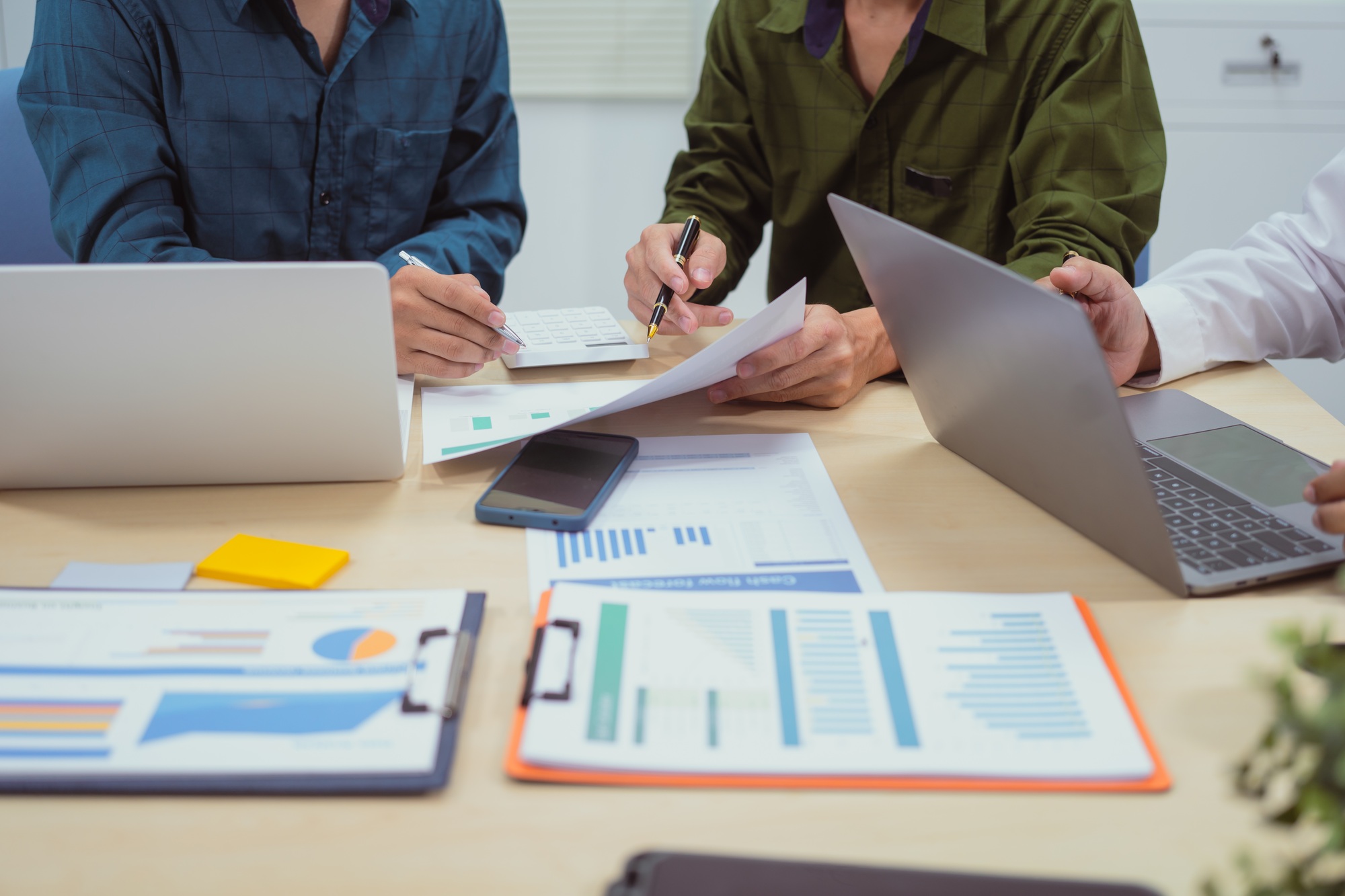 Close-up of a businessman in meeting office discussing topics related digital marketing management